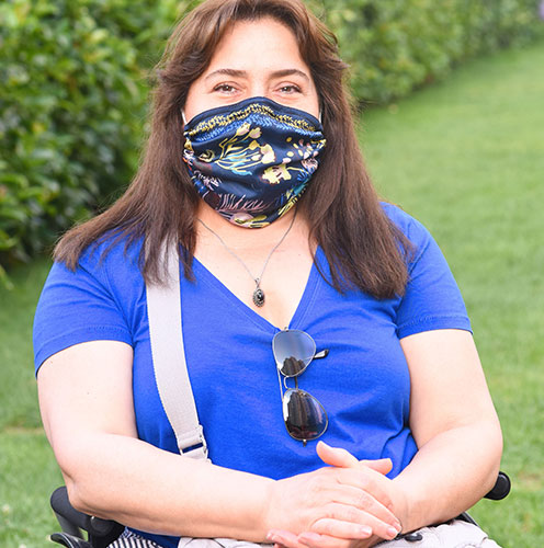 Photo of woman with a mask.
